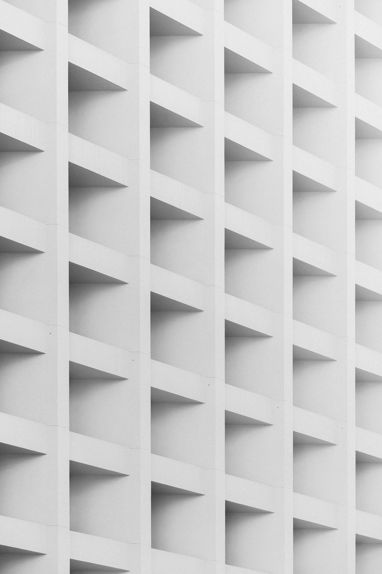 white graphical building - stock image - unsplash